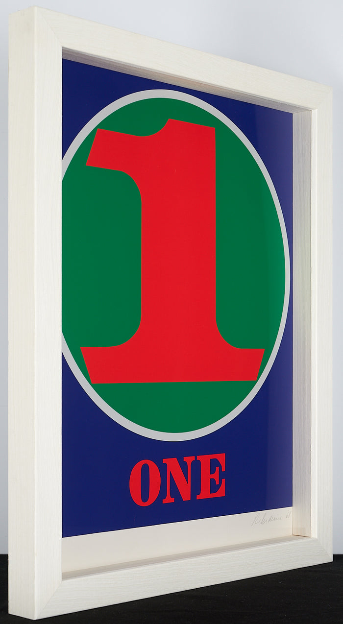 Framed artwork featuring the number 1 in red, green, and blue on a white background, signed and dated by the artist.